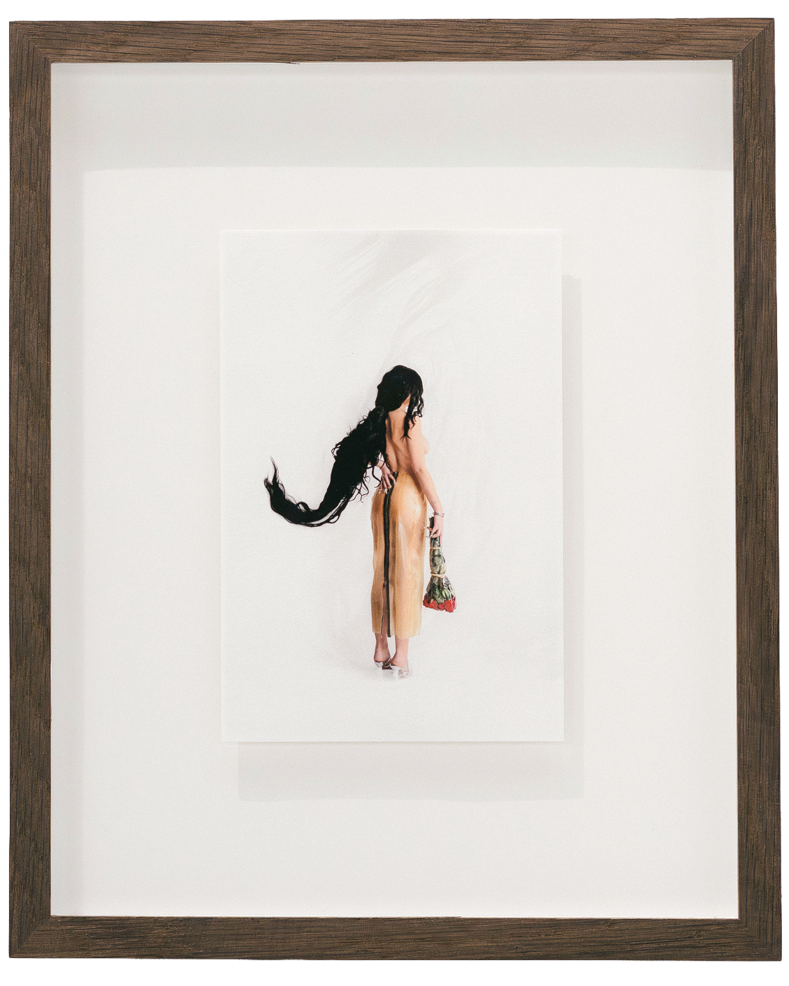 Fine art photograph by Alaïa Fonk of a woman seen from behind holding a bouquet of roses, standing against a white background.